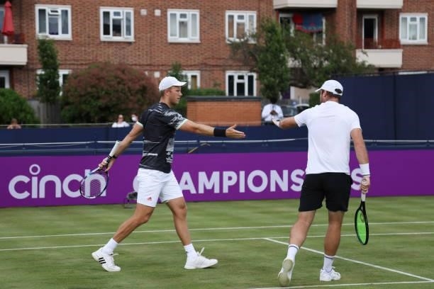 Dominic Inglot and Luke Bambridge of Great Britain celebrate in their First Round Doubles match against James Ward and Stuart Parker of Great Britain...