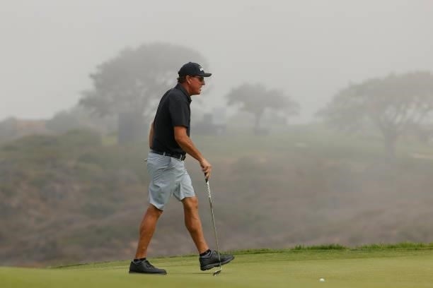 Phil Mickelson of the United States walks across the 13th green during a practice round prior to the start of the 2021 U.S. Open at Torrey Pines Golf...