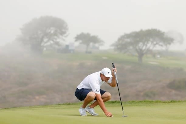 Bryson DeChambeau of the United States prepares to putt on the 13th green during a practice round prior to the start of the 2021 U.S. Open at Torrey...