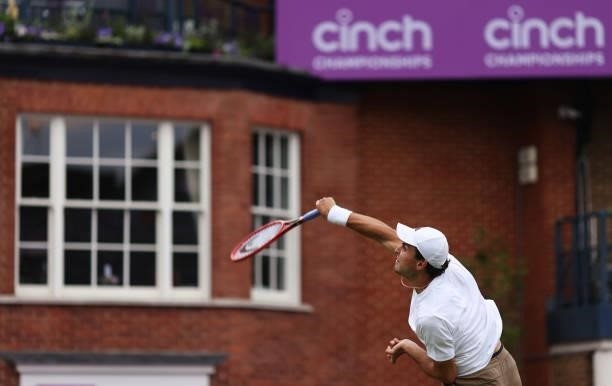 Aslan Karatsev of Russia serves in his First Round match against Alejandro Tabilo of Chile during Day 1 of the cinch Championships at The Queen's...