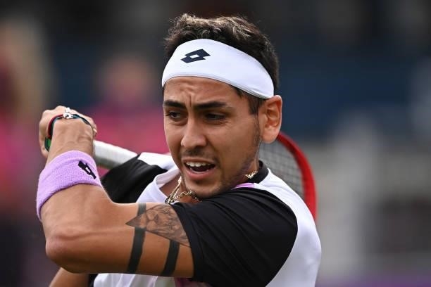 Alejandro Tabilo of Chile plays a forehand in his First Round match against Aslan Karatsev of Russia during Day 1 of the cinch Championships at The...