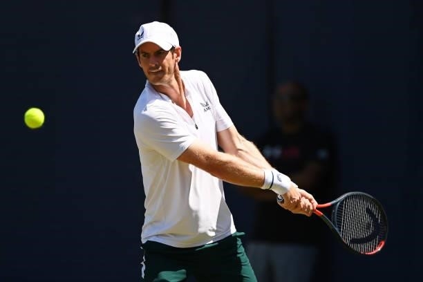 Andy Murray of Great Britain plays a backhand during a practice session during Day 1 of the cinch Championships at The Queen's Club on June 14, 2021...