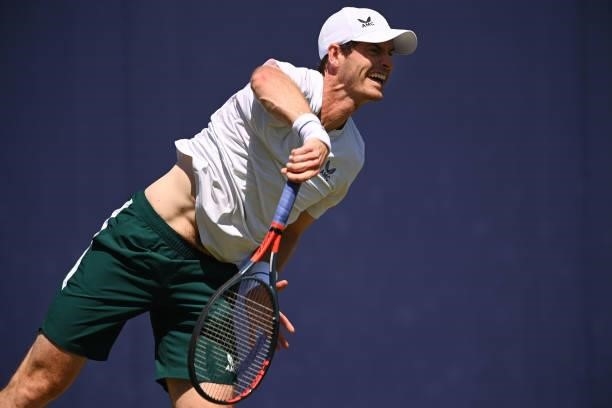 Andy Murray of Great Britain serves during a practice session during Day 1 of the cinch Championships at The Queen's Club on June 14, 2021 in London,...