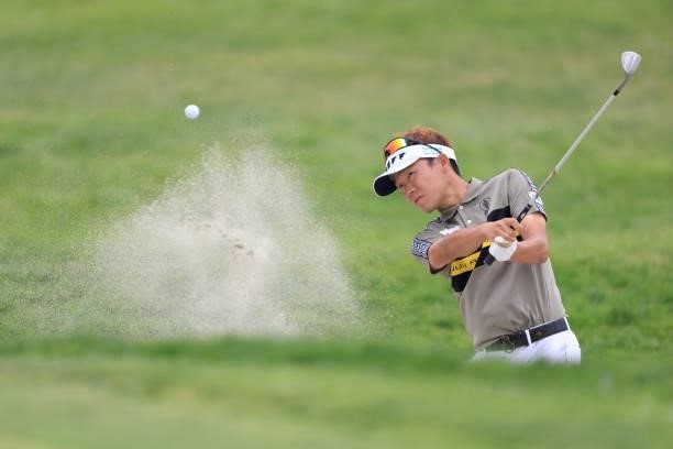 Yosuke Asaji of Japan plays a shot from a bunker on the first hole during a practice round prior to the start of the 2021 U.S. Open at Torrey Pines...