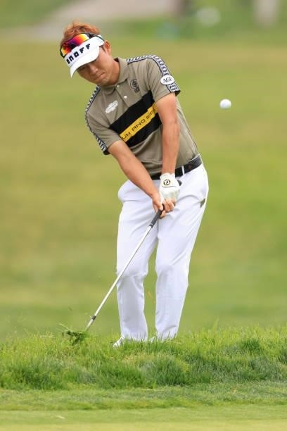 Yosuke Asaji of Japan chips to the first green during a practice round prior to the start of the 2021 U.S. Open at Torrey Pines Golf Course on June...