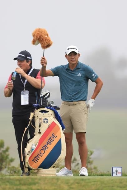 Collin Morikawa of the United States pulls a club on the fifth tee during a practice round prior to the start of the 2021 U.S. Open at Torrey Pines...