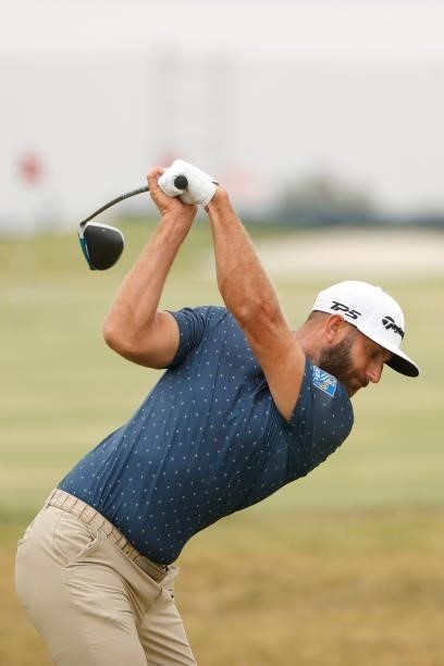 Dustin Johnson of the United States plays a shot on the range during a practice round prior to the start of the 2021 U.S. Open at Torrey Pines Golf...