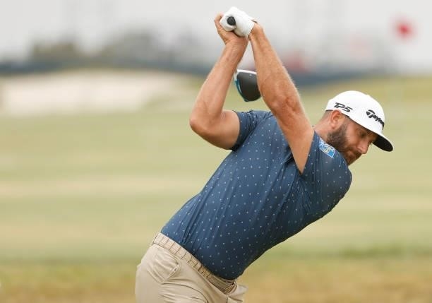 Dustin Johnson of the United States plays a shot on the range during a practice round prior to the start of the 2021 U.S. Open at Torrey Pines Golf...