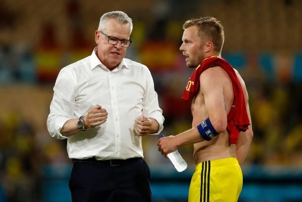 Jan Andersson, Head Coach of Sweden celebrates with Sebastian Larsson of Sweden following the UEFA Euro 2020 Championship Group E match between Spain...