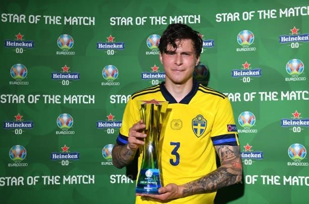 Victor Lindeloef of Sweden poses for a photograph with their Heineken "Star of the Match
