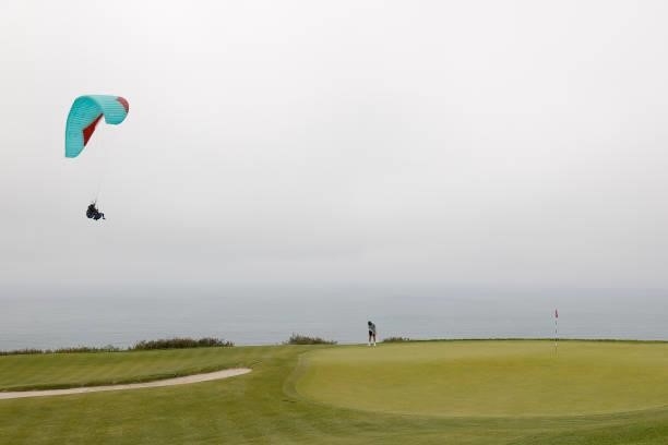 Tommy Fleetwood of England putts on the fourth green during a practice round prior to the start of the 2021 U.S. Open at Torrey Pines Golf Course on...
