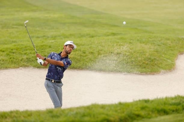 Akshay Bhatia of the United States plays a shot from a bunker on the 15th hole during a practice round prior to the start of the 2021 U.S. Open at...