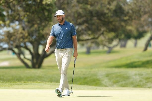 Dustin Johnson of the United States walks the second hole during a practice round prior to the start of the 2021 U.S. Open at Torrey Pines Golf...