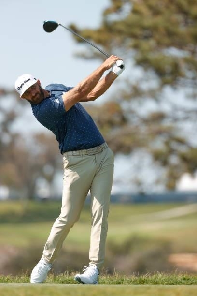 Dustin Johnson of the United States plays his shot from the fifth tee during a practice round prior to the start of the 2021 U.S. Open at Torrey...