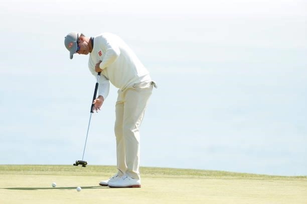 Adam Scott of Australia putts on the fourth green during a practice round prior to the start of the 2021 U.S. Open at Torrey Pines Golf Course on...