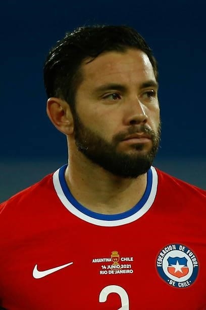 Eugenio Mena of Chile looks on before a Group A match between Argentina and Chile at Estadio Olímpico Nilton Santos as part of Copa America Brazil...