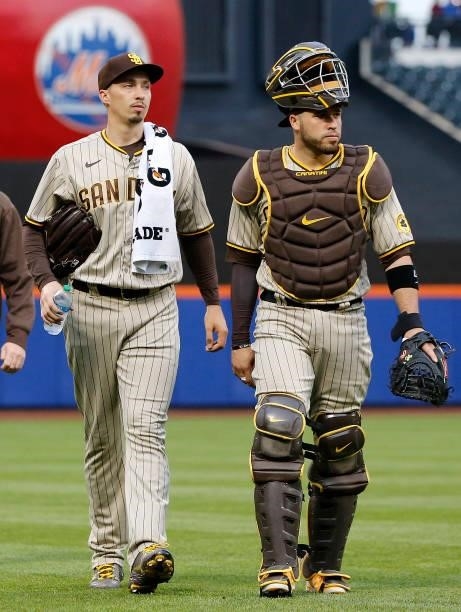 Blake Snell and Victor Caratini of the San Diego Padres prepare for a game against the New York Mets at Citi Field on June 11, 2021 in New York City....