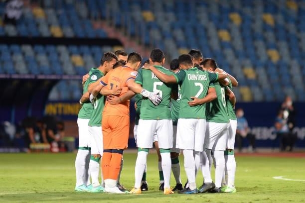 Players of Bolivia huddle before a Group A match between Paraguay and Bolivia at Estádio Olímpico as part of Copa America Brazil 2021 on June 14,...