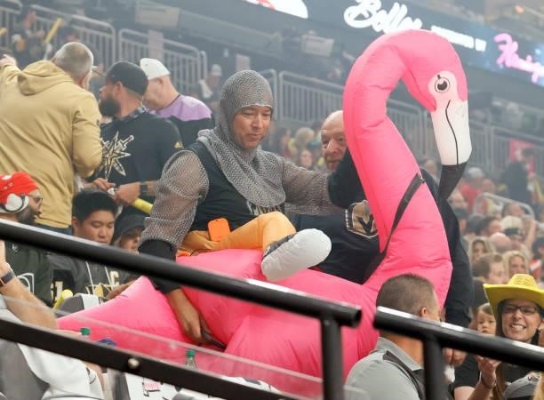 Fan wearing a knight outfit and an inflatable pink flamingo arrives at Game One of the Stanley Cup Semifinals during the 2021 Stanley Cup Playoffs...