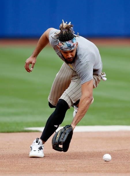 Fernando Tatis Jr. #23 of the San Diego Padres works out on the field before a game against the New York Mets at Citi Field on June 11, 2021 in New...