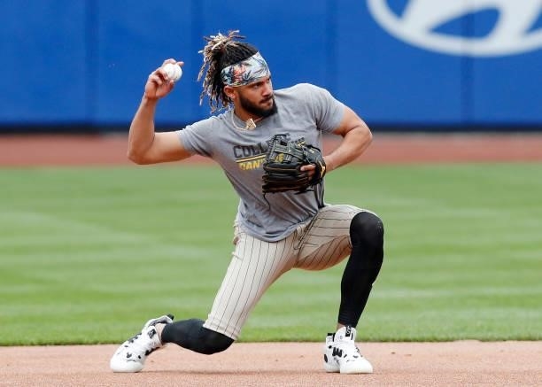 Fernando Tatis Jr. #23 of the San Diego Padres works out on the field before a game against the New York Mets at Citi Field on June 11, 2021 in New...