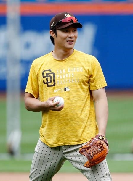Ha-Seong Kim of the San Diego Padres works out on the field before a game against the New York Mets at Citi Field on June 11, 2021 in New York City....
