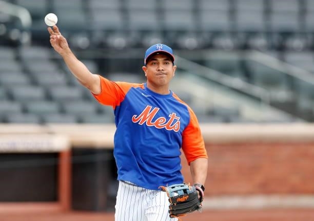 New York Mets manager Luis Rojas works out on the field before a game against the San Diego Padres at Citi Field on June 11, 2021 in New York City....