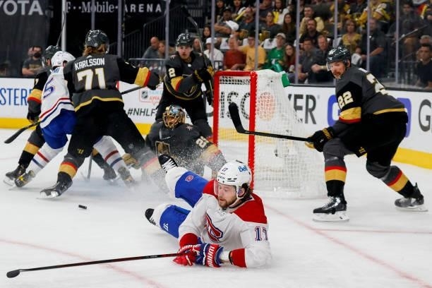 Josh Anderson of the Montreal Canadiens gets tripped up against the Vegas Golden Knights during the first period in Game One of the Stanley Cup...