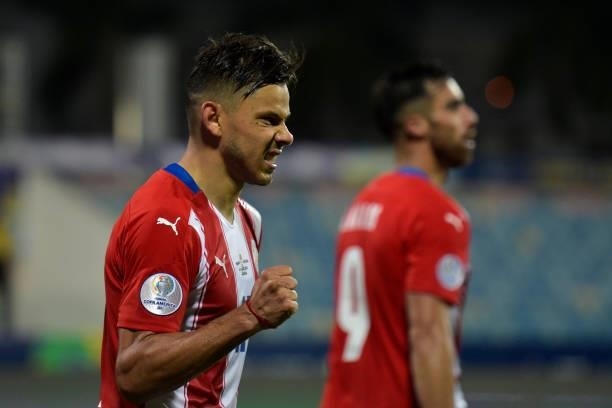 Angel Romero of Paraguay celebrates after scoring the third goal of his team during a Group A match between Paraguay and Bolivia at Estádio Olímpico...