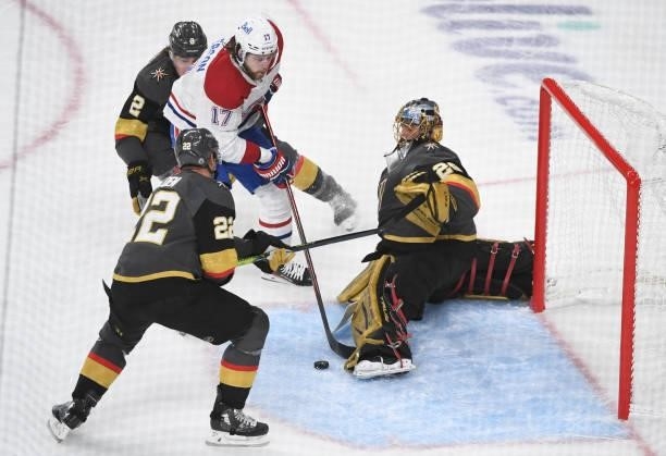Marc-Andre Fleury of the Vegas Golden Knights stops a shot by Josh Anderson of the Montreal Canadiens during the first period in Game One of the...