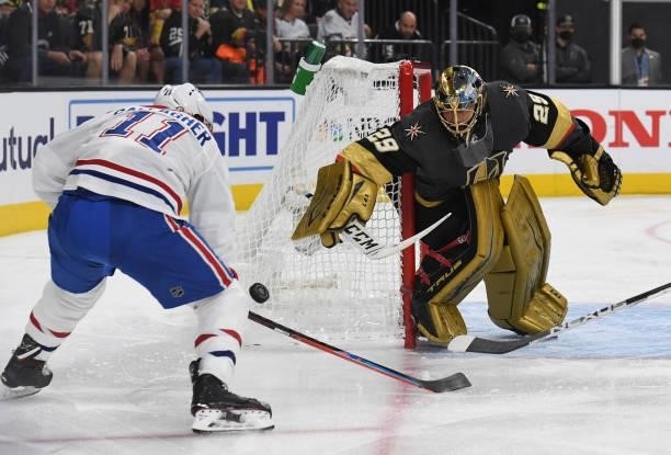 Marc-Andre Fleury of the Vegas Golden Knights defends the net against Brendan Gallagher of the Montreal Canadiens during the second period in Game...