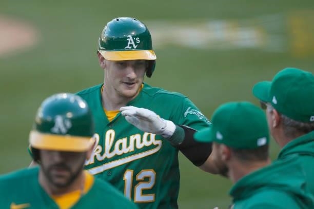 Sean Murphy of the Oakland Athletics celebrates after hitting a two-run home run in the bottom of the second inning against the Los Angeles Angels at...