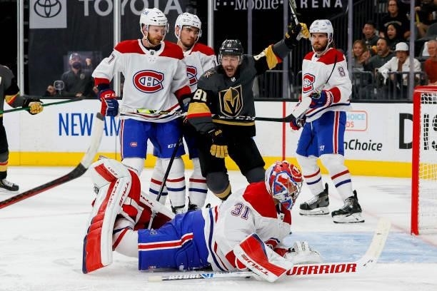 Jonathan Marchessault of the Vegas Golden Knights celebrates a goal by his teammate Alec Martinez past Carey Price of the Montreal Canadiens during...