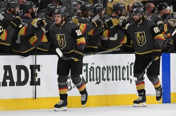Mattias Janmark of the Vegas Golden Knights celebrates with teammates after scoring a goal during the second period against the Montreal Canadiens in...