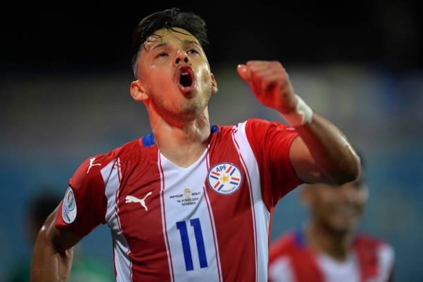 Angel Romero of Paraguay celebrates after scoring the second goal of his team during a Group A match between Paraguay and Bolivia at Estádio Olímpico...