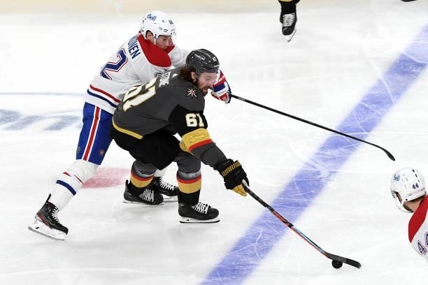 Mark Stone of the Vegas Golden Knights is defended by Artturi Lehkonen of the Montreal Canadiens during the second period in Game One of the Stanley...