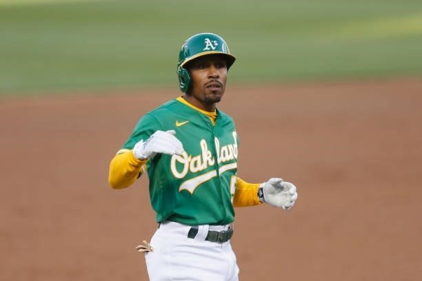 Tony Kemp of the Oakland Athletics reacts after hitting an RBI double before advancing to third base on a fielding error in the bottom of the third...
