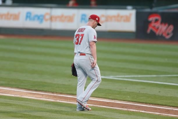 Starting pitcher Dylan Bundy of the Los Angeles Angels exits the game against the Oakland Athletics in the bottom of the third inning at RingCentral...