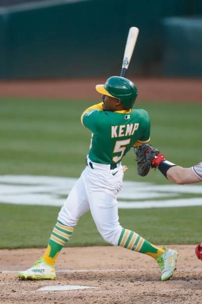 Tony Kemp of the Oakland Athletics hits an RBI double before advancing to third base on a fielding error in the bottom of the third inning against...