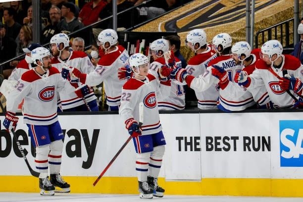 Cole Caufield of the Montreal Canadiens is congratulated by his teammates after scoring a goal against the Vegas Golden Knights during the second...