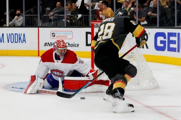 Carey Price of the Montreal Canadiens makes the save against William Carrier of the Vegas Golden Knights during the second period in Game One of the...