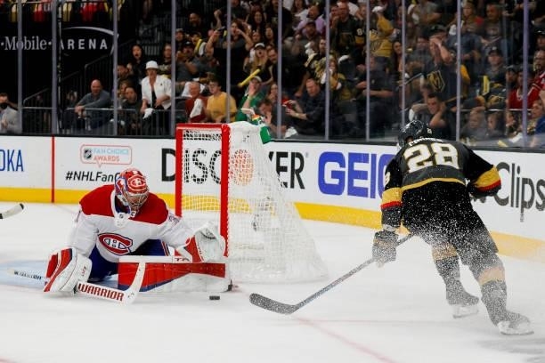 Carey Price of the Montreal Canadiens makes the save against William Carrier of the Vegas Golden Knights during the second period in Game One of the...