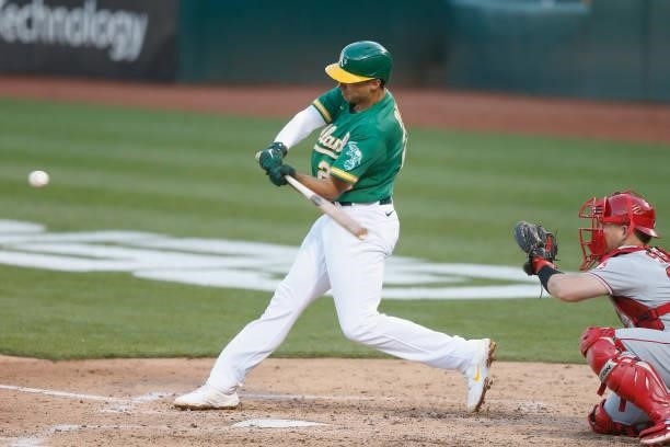 Matt Olson of the Oakland Athletics hits an RBI sacrifice fly ball in the bottom of the third inning against the Los Angeles Angels at RingCentral...
