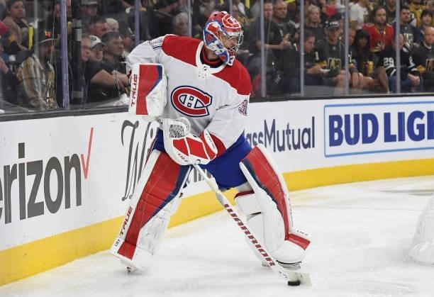 Carey Price of the Montreal Canadiens plays the puck during the third period against the Vegas Golden Knights in Game One of the Stanley Cup...