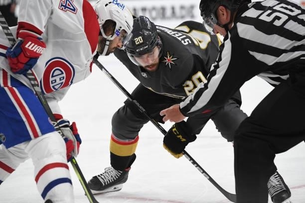 Chandler Stephenson of the Vegas Golden Knights faces off with Phillip Danault of the Montreal Canadiens during the third period in Game One of the...