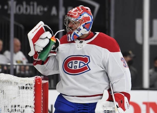 Carey Price of the Montreal Canadiens rests during a stoppage in play during the third period against the Vegas Golden Knights in Game One of the...