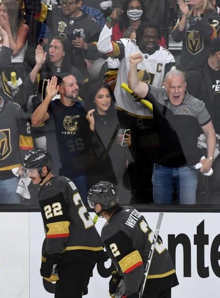 Fans cheer as Nick Holden and Zach Whitecloud of the Vegas Golden Knights skate off the ice after a first-period goal against the Montreal Canadiens...