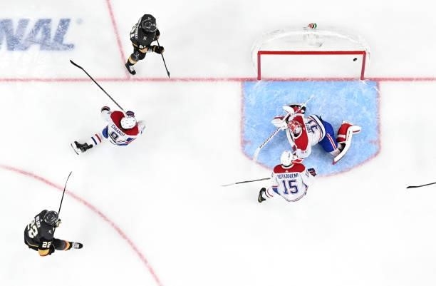 Nick Holden of the Vegas Golden Knights scores a goal during the third period against the Montreal Canadiens in Game One of the Stanley Cup...
