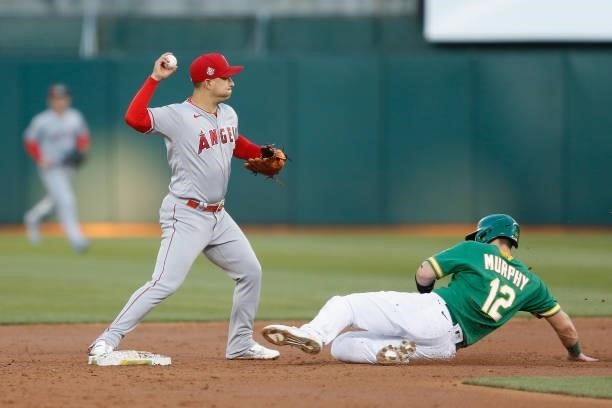 Jose Iglesias of the Los Angeles Angels gets the out at second base on Sean Murphy of the Oakland Athletics in the bottom of the third inning at...