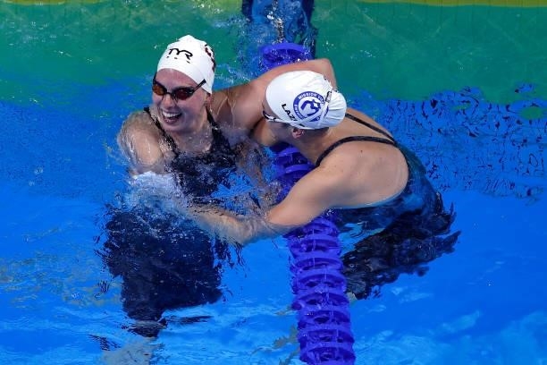 Lilly King and Annie Lazor of the United States reacts after competing in a semifinal heat for the Women’s 100m breaststroke during Day Two of the...